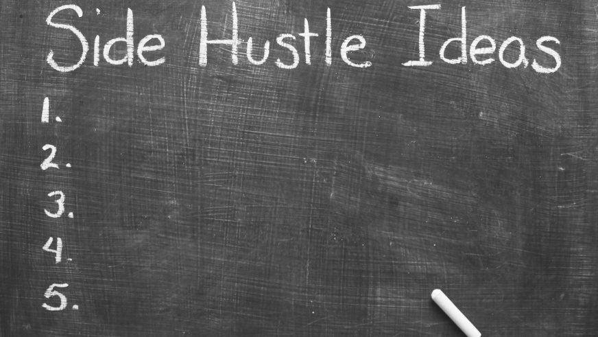Side hustle ideas written on chalkboard