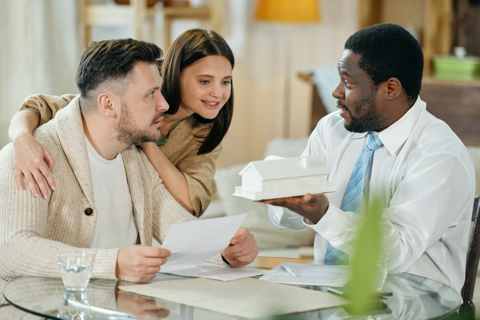 Young couple with mortgage consultant